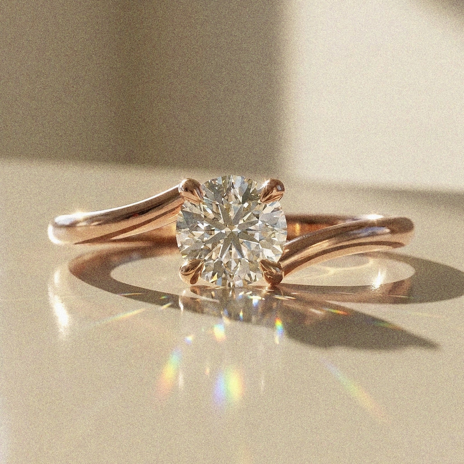 Bely - round brilliant-cut stone - solitaire