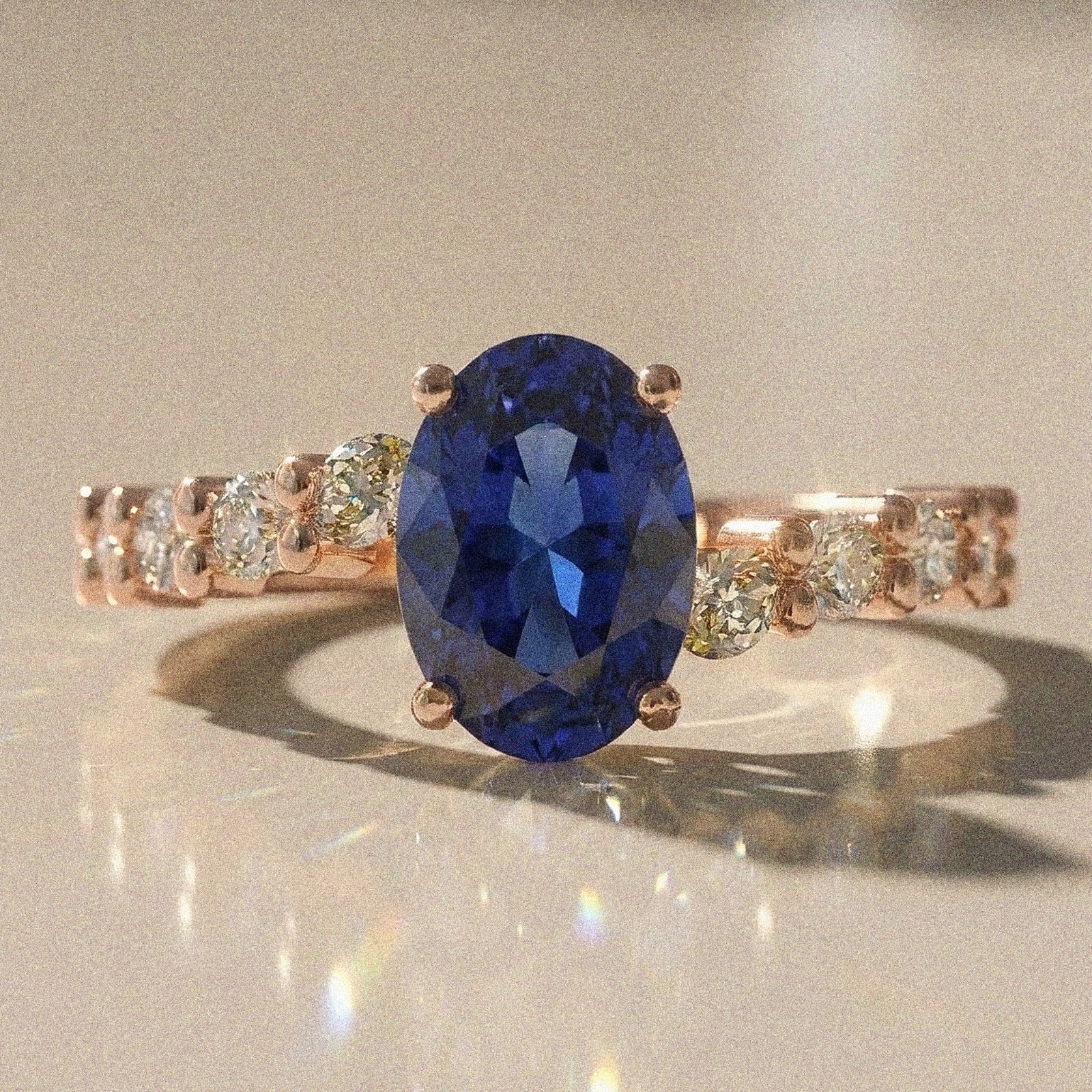 Bergenie - Oval stone engagement ring with side stones
