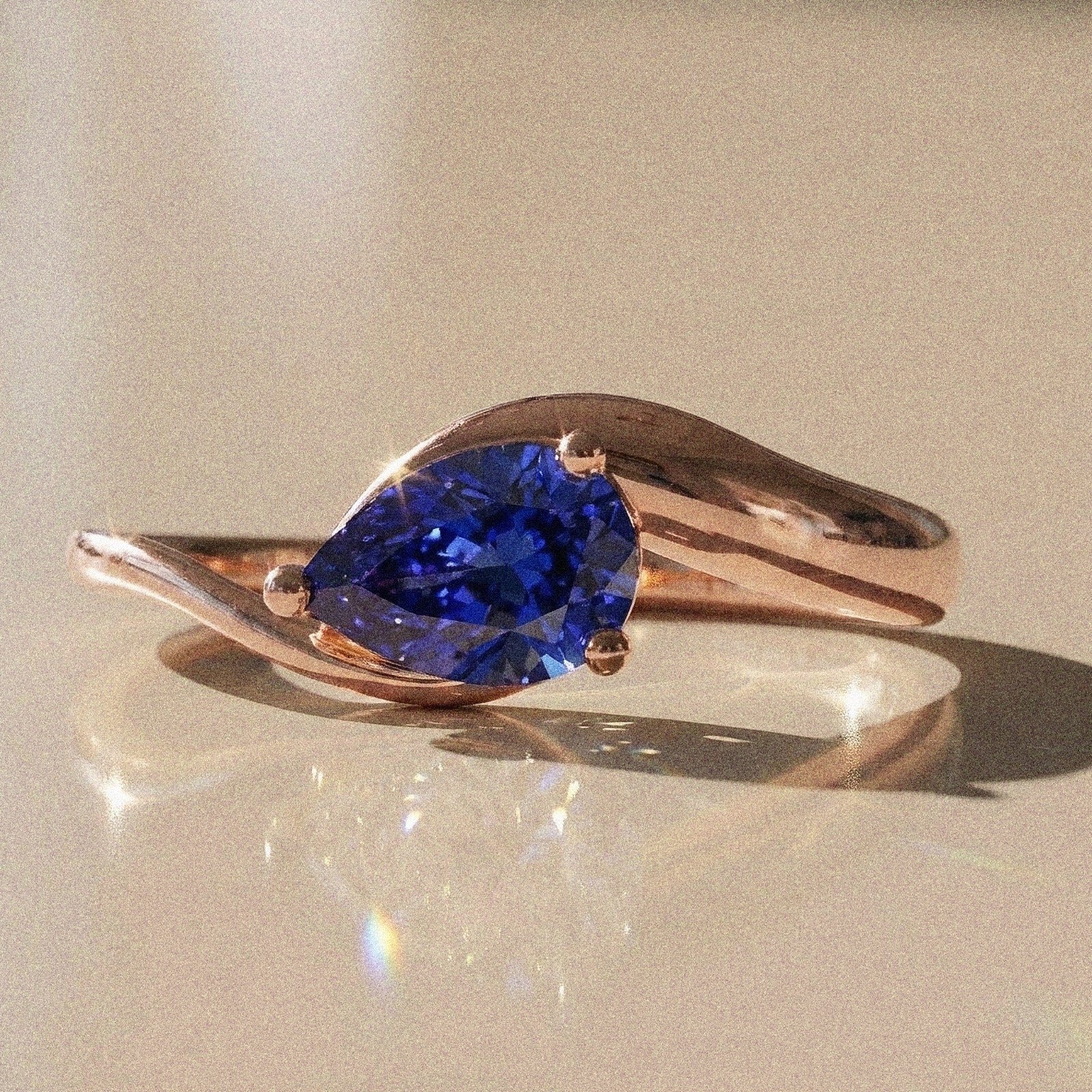 Berenice - Pear-shaped solitaire engagement ring