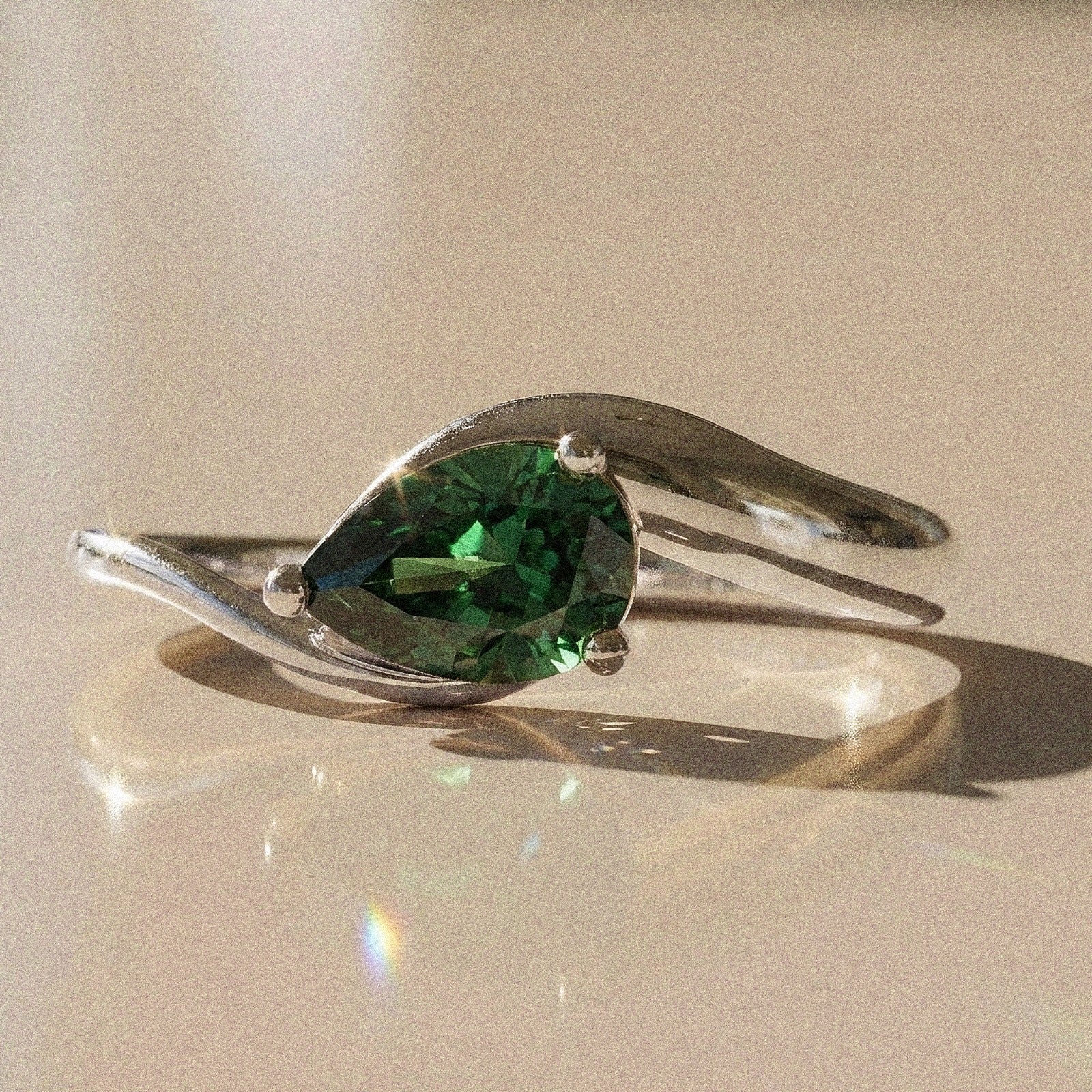 Berenice - Pear-shaped solitaire engagement ring