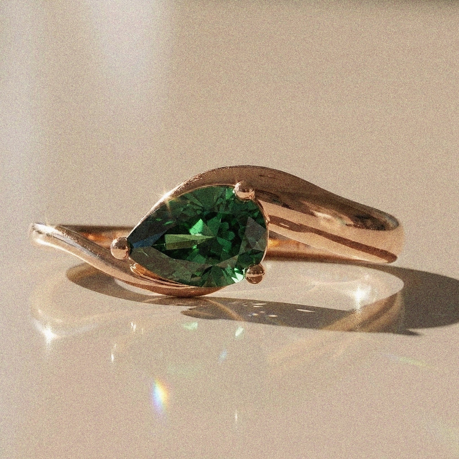 Berenice - Pear-shaped solitaire engagement ring