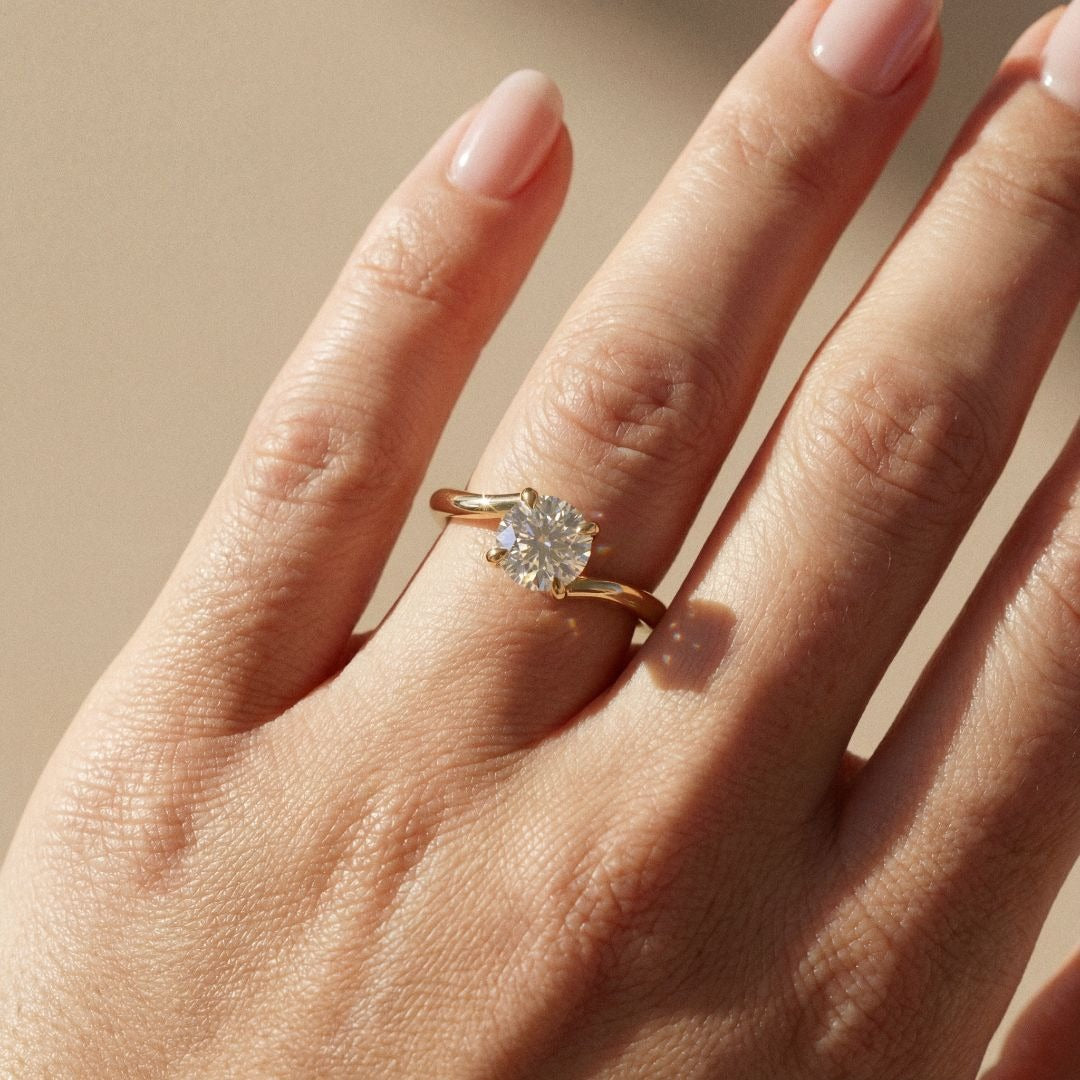 Bely - pierre ronde taille brillant - solitaire