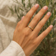 Aurora mixed wedding band – pear-shaped stone