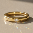 Aurora mixed wedding band – pear-shaped stone