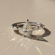 Madeleine - Solitaire accompanied pear-shaped