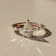 Madeleine - Solitaire accompanied pear-shaped
