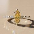 Leontina - engagement ring with a central stone accompanied