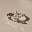Madeleine - Solitaire accompanied pear-shaped