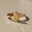 Madeleine - Solitaire accompanied pear-shaped
