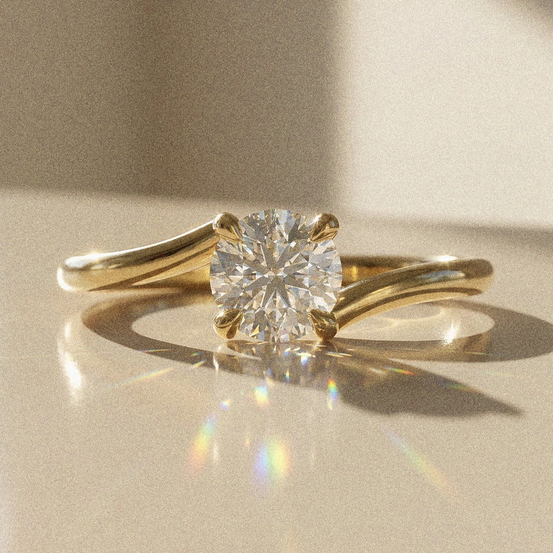 Bely - round brilliant-cut stone - solitaire