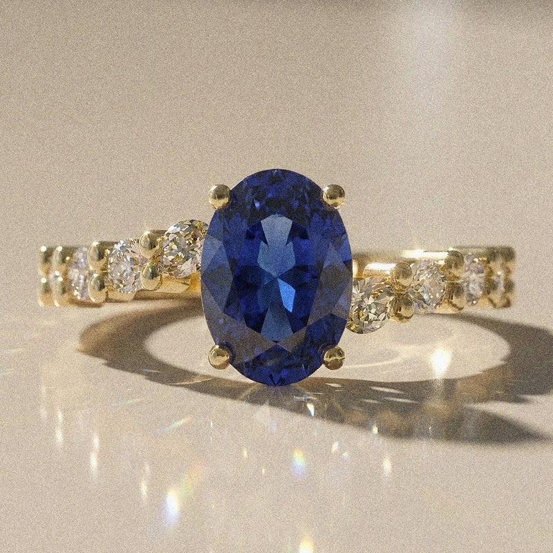 Bergenie - Bague de fiançailles pierre ovale et pierres latérales