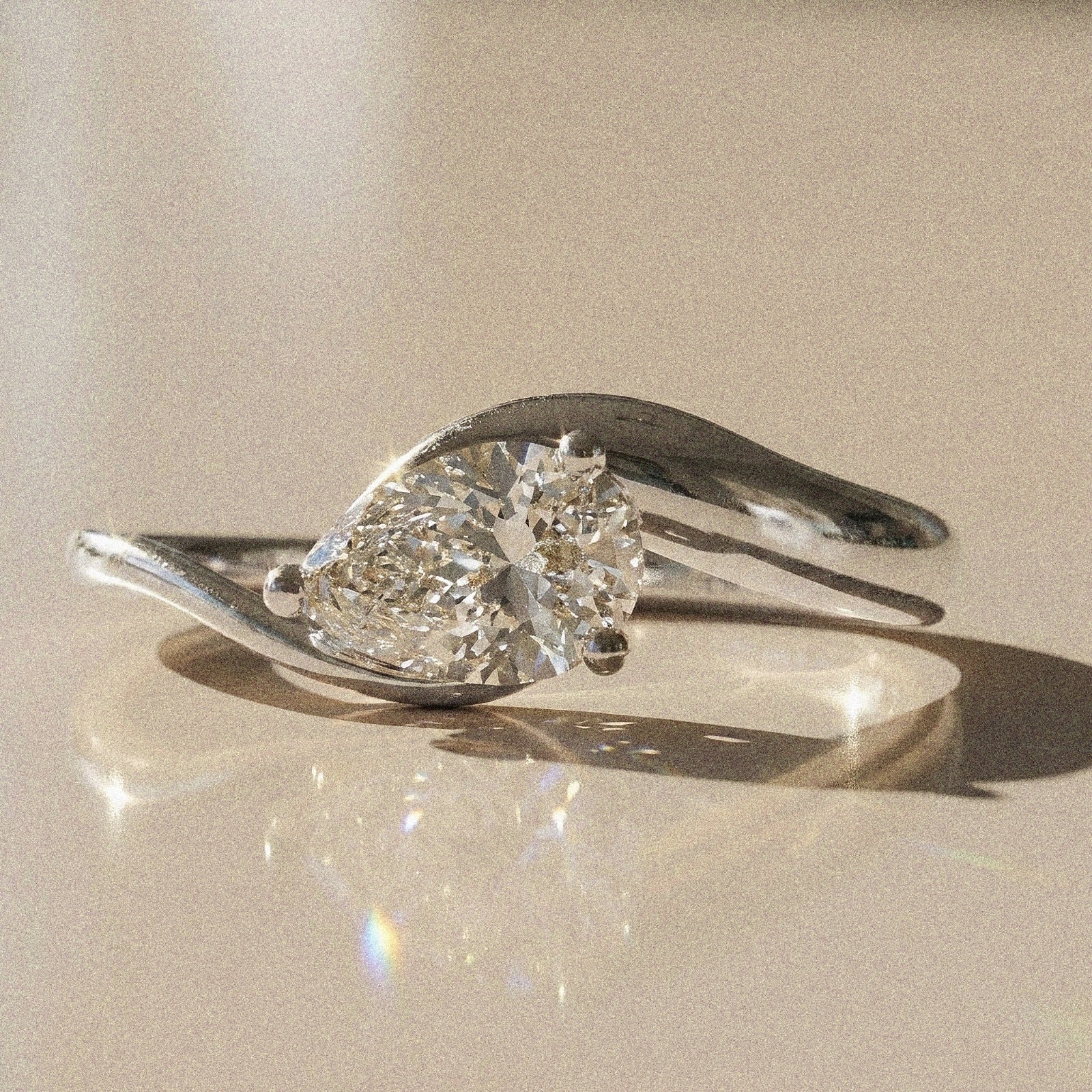 Berenice - Pear-shaped solitaire engagement ring