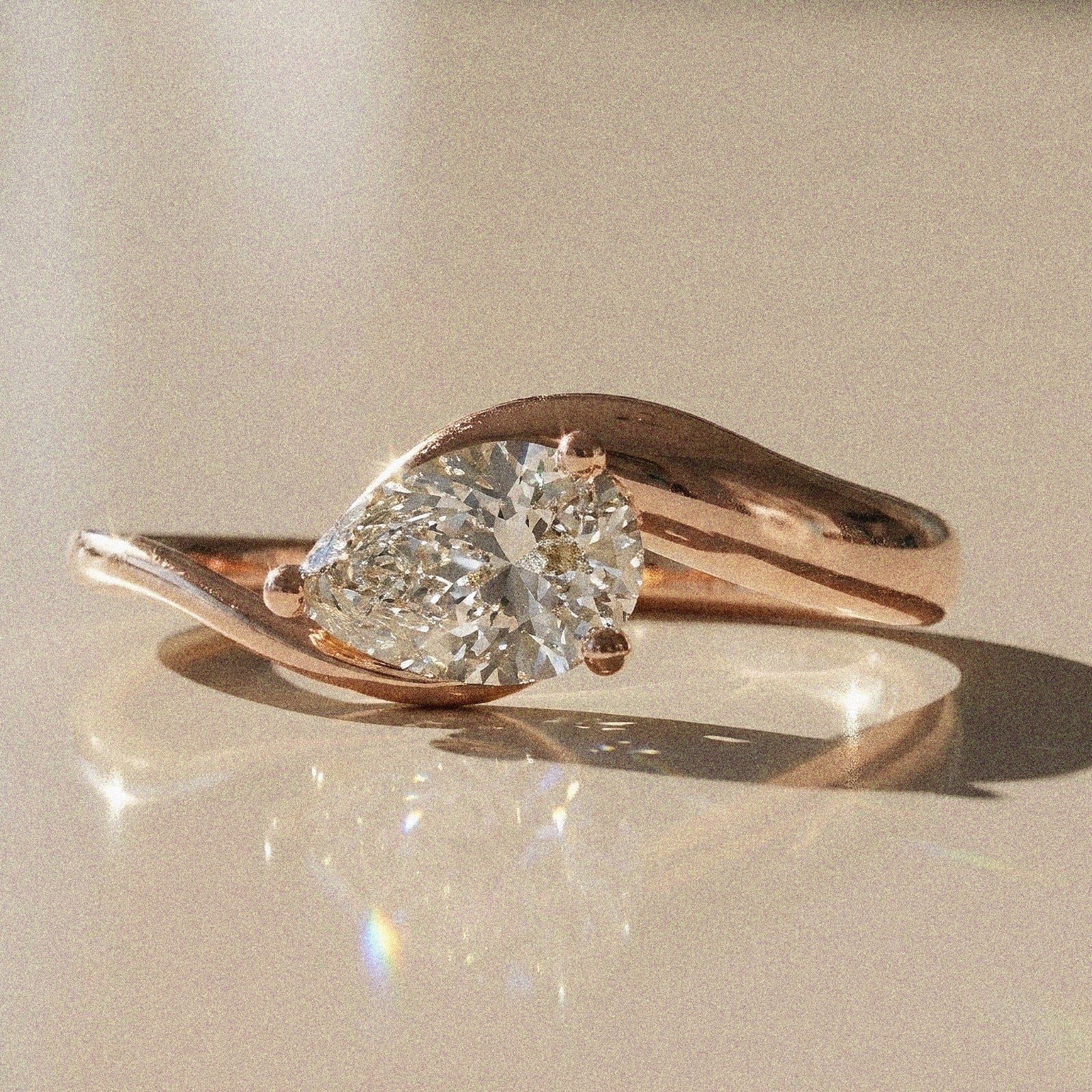 Berenice - Pear-shaped solitaire engagement ring