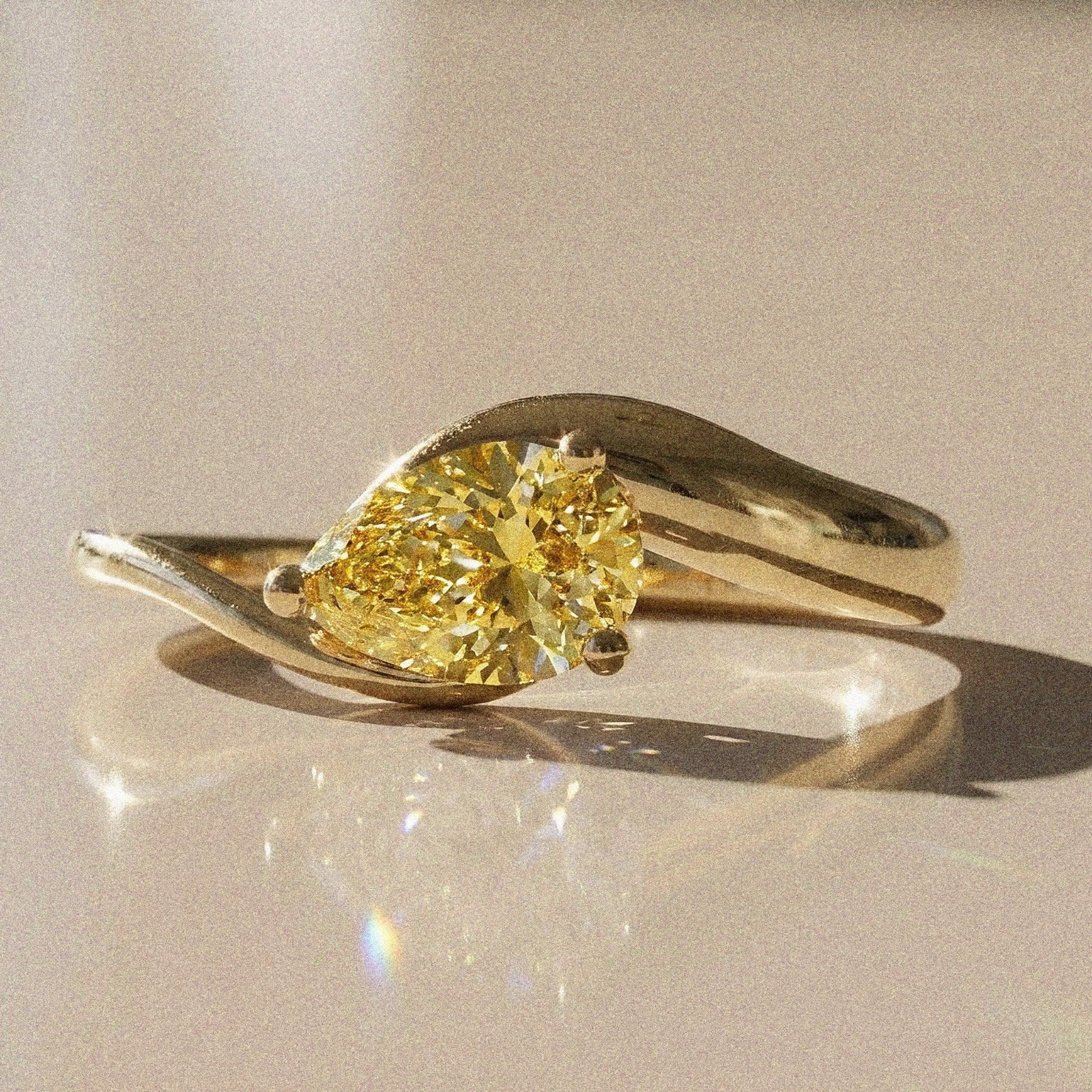 Berenice - Pear-shaped solitaire engagement ring